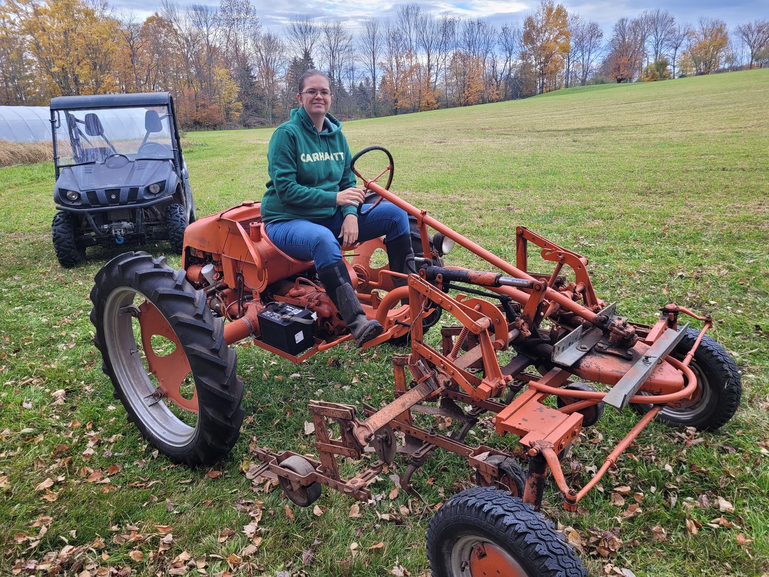 My wife looks good on our new Model G by Allis Chalmers.